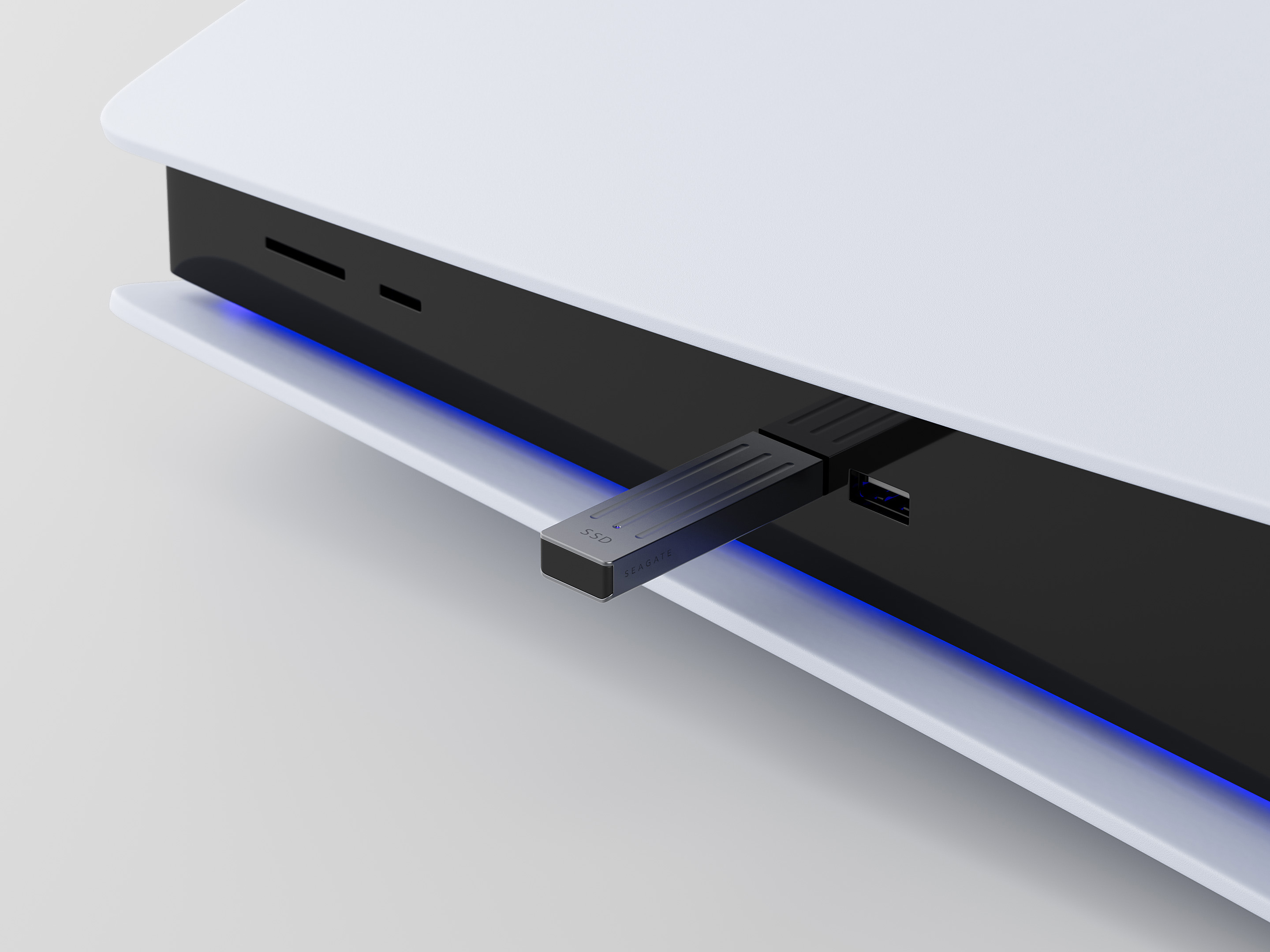 Seagate ultra-compact NVMe SSD for PlayStation 5 shown beside the console expansion slot