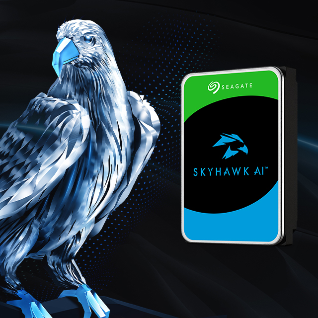 Seagate SkyHawk AI surveillance hard drive beside the faceted SkyHawk eagle on a dark background