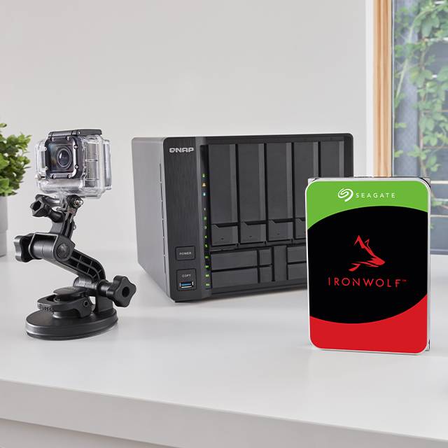 A multi-bay NAS system with a Seagate IronWolf drive and a small form factor camera
