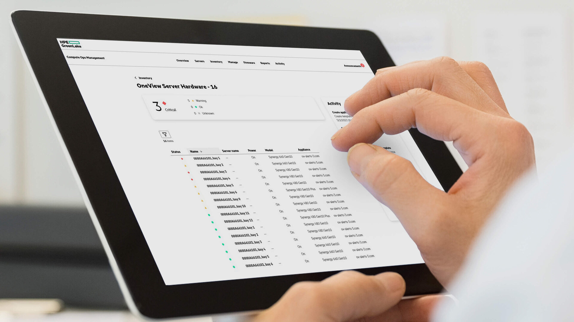 HPE OneView server hardware inventory with per-bay status, model and appliance details on a tablet