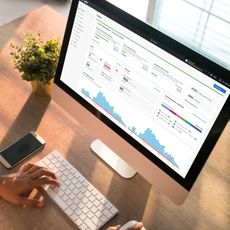 High angle photo of monitor with Duo admin dashboard